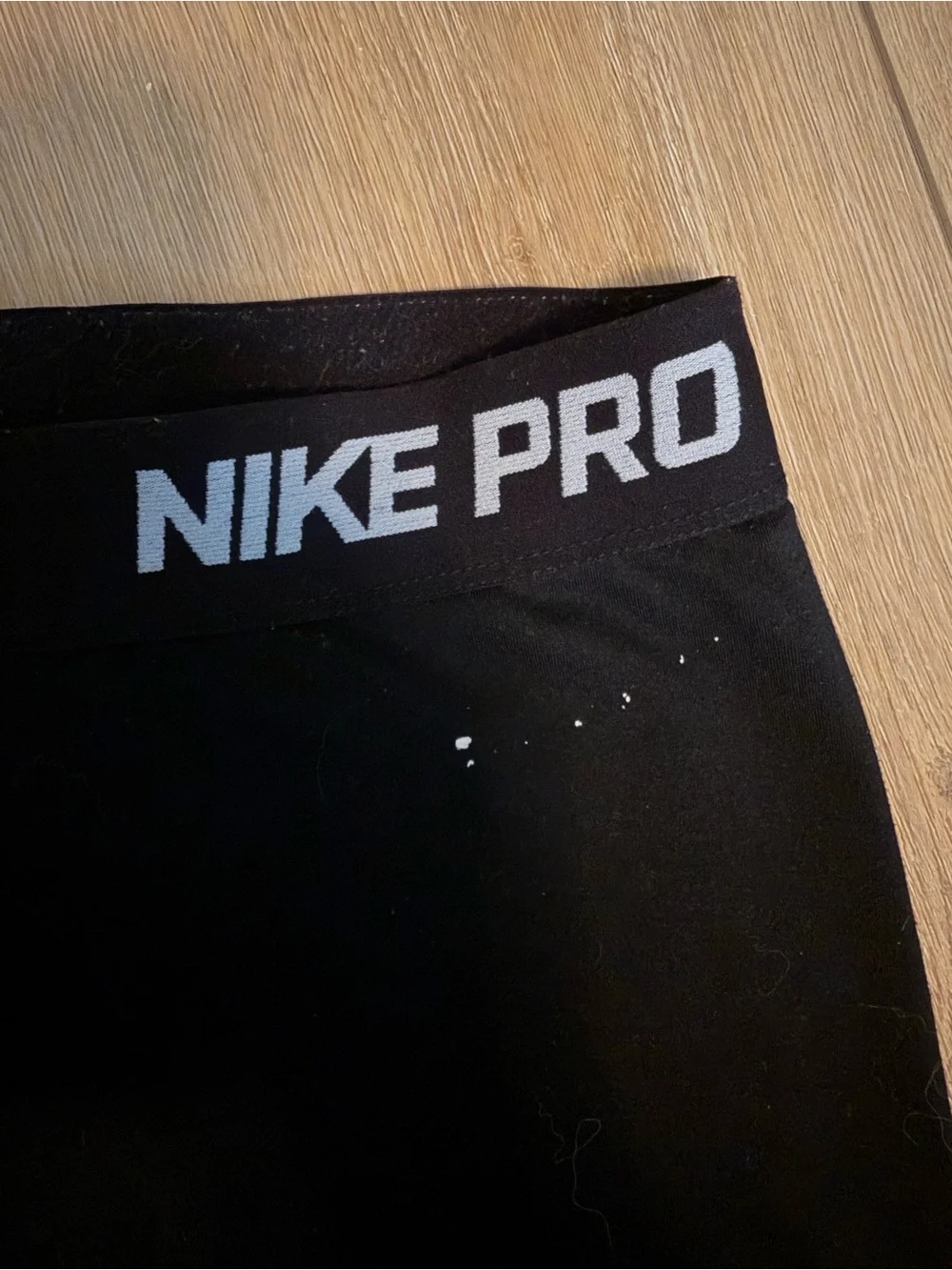 Nike Black Girls' Athletic Leggings with 'Just Do It' Side Graphic